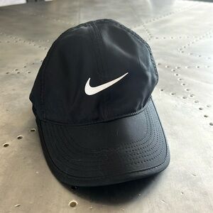 Nike featherlight dry-fit women’s hat. Seems to run small.